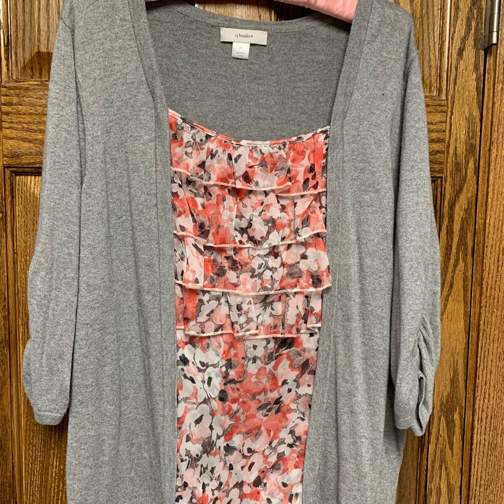 Sweater with shell attached